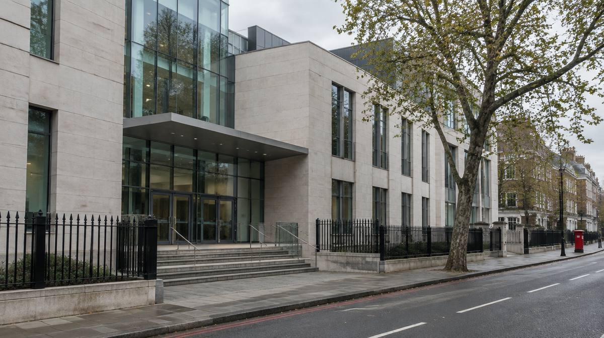 The stone and glass front of a modern London magistrates’ court